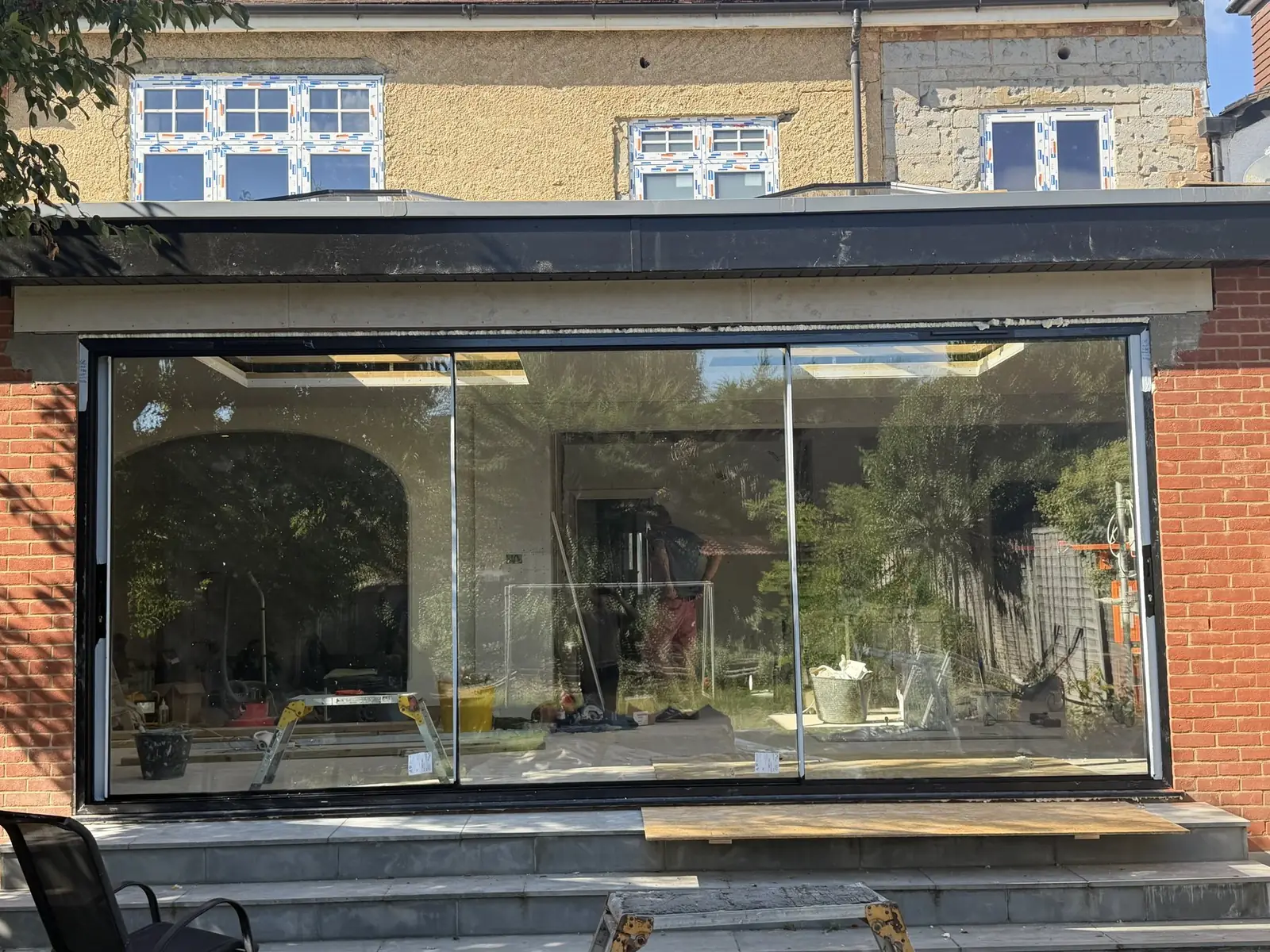 The slim-framed glazing in place on the extension