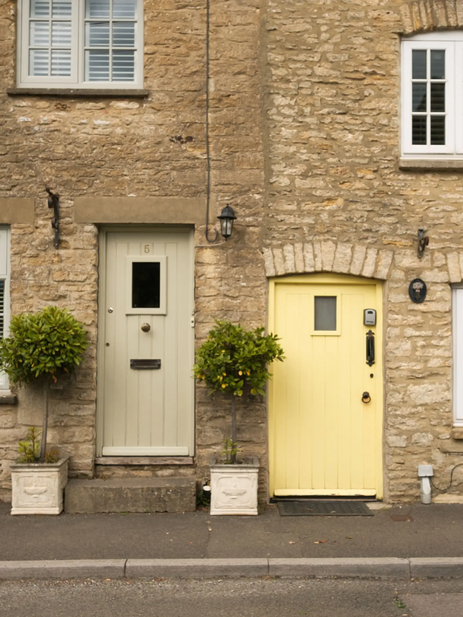 Composite front doors on a cottage terrace