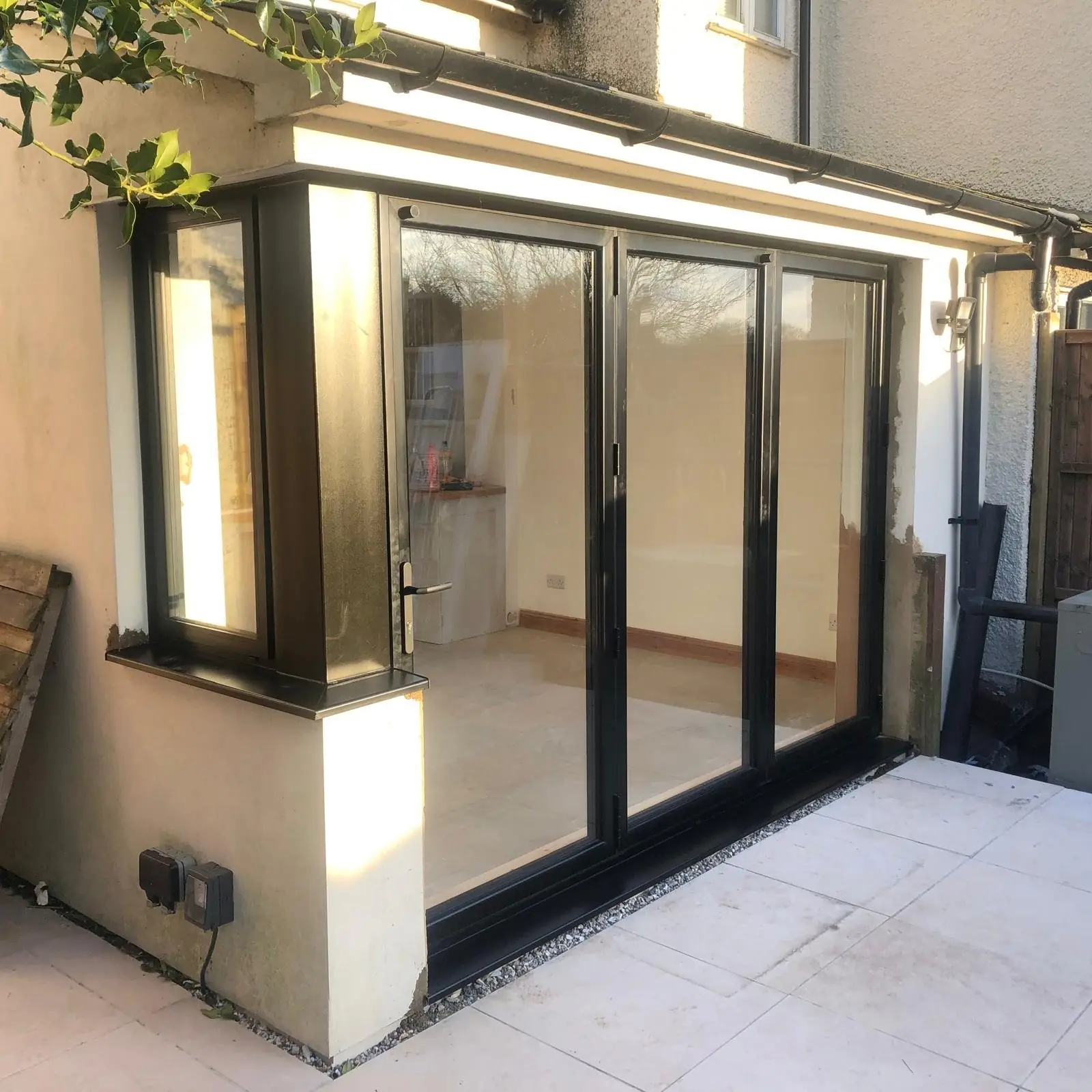 Black aluminium bifold doors, closed