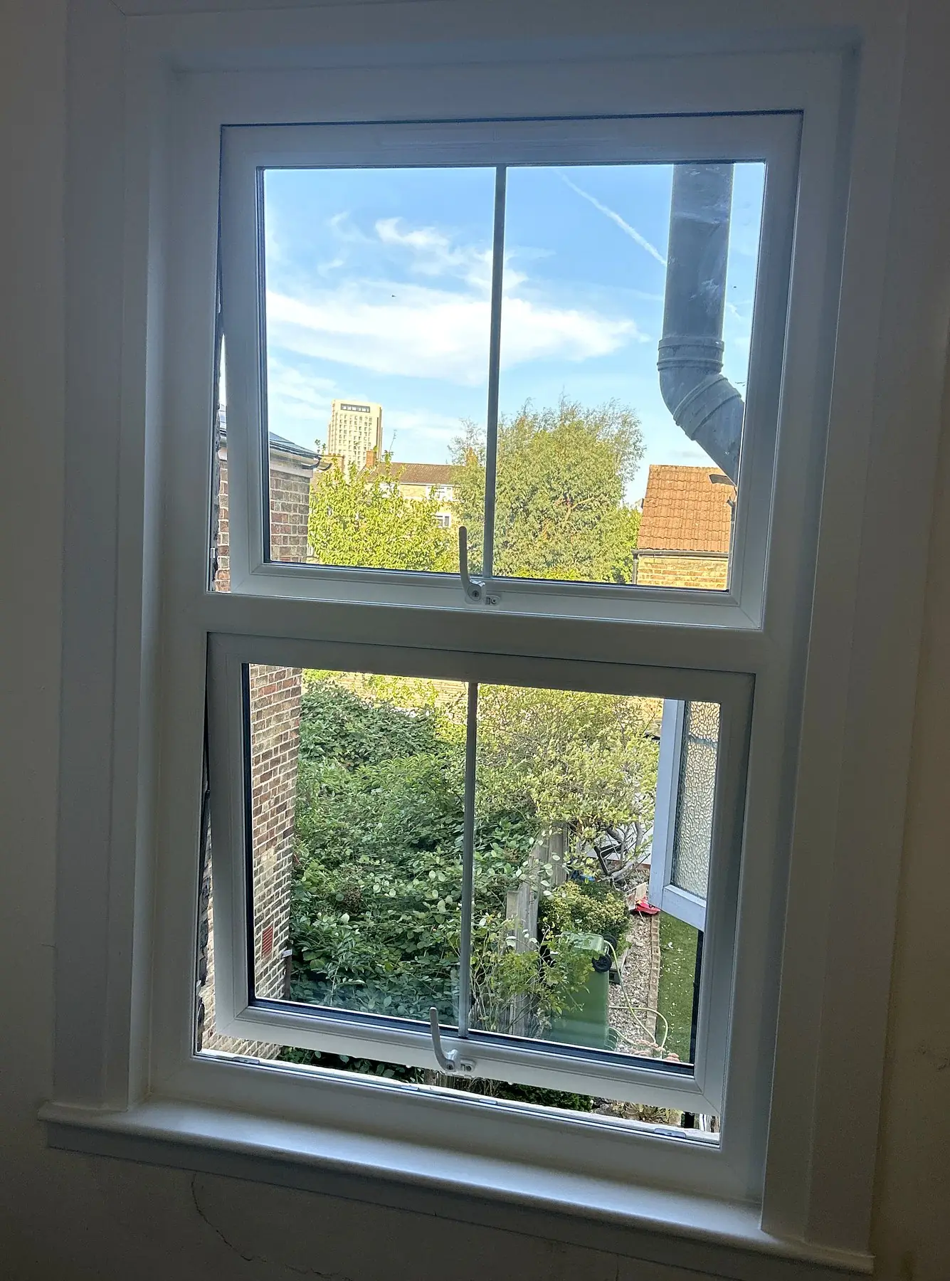 White uPVC window onto the garden